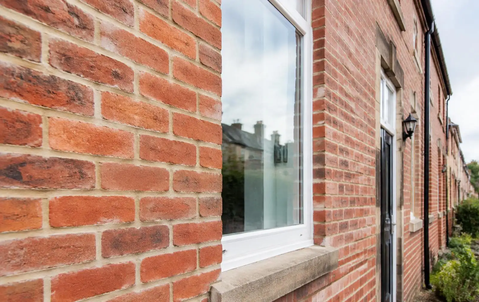Brick pointing and repointing in Yorkshire Lime mortar repointing on a red brick Victorian terrace in Sheffield