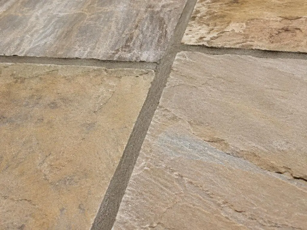 Patio Pointing & Repointing in Yorkshire Freshly repointed mortar joints between sandstone patio slabs in Yorkshire